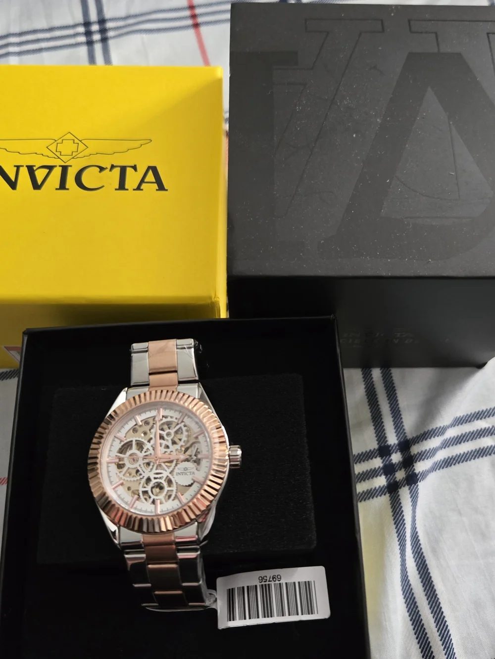 Invicta Men’s Rose Gold and Silver Skeleton Dial Watch